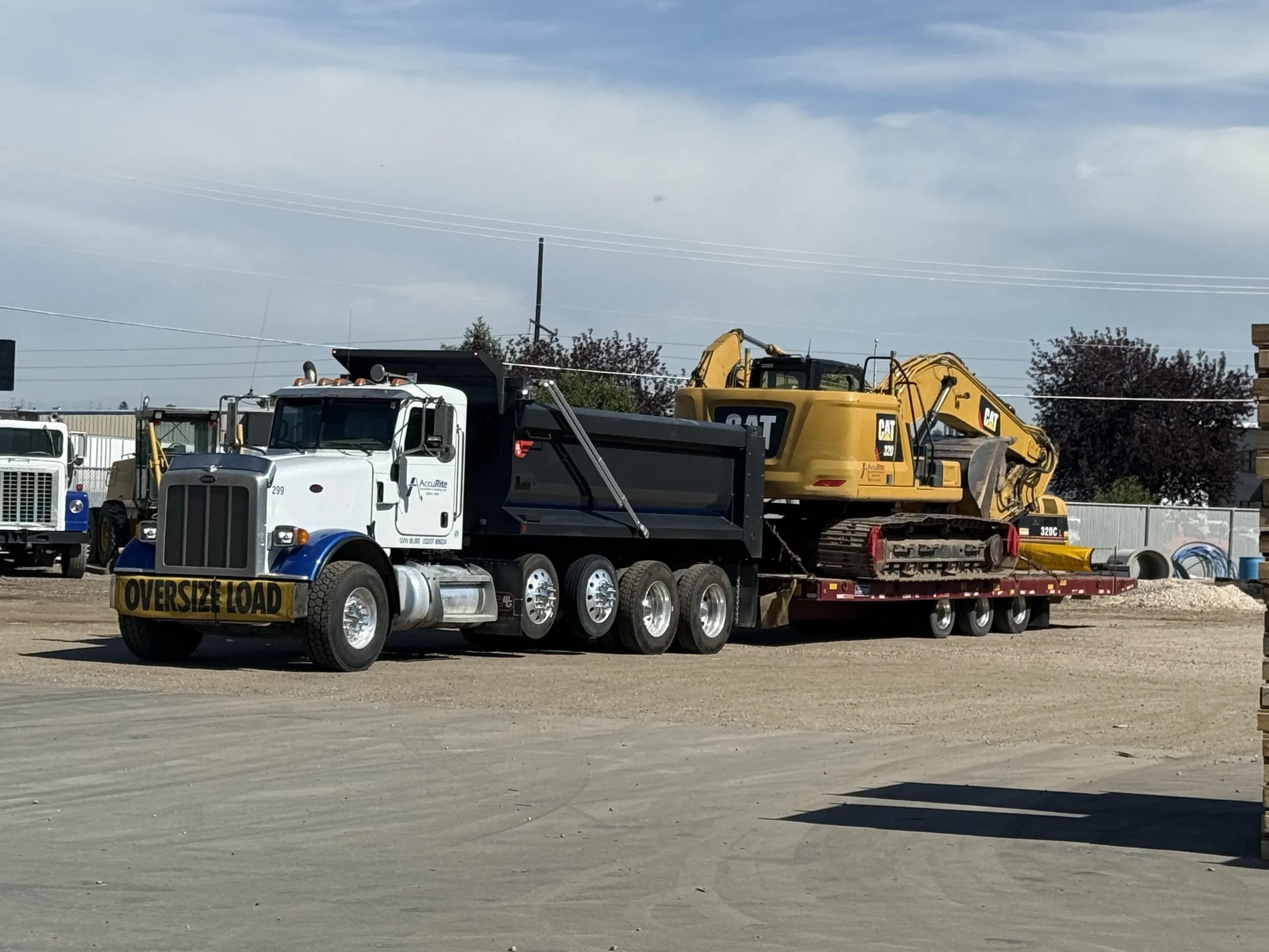 excavator delivery asphalt parking lot demolition utah