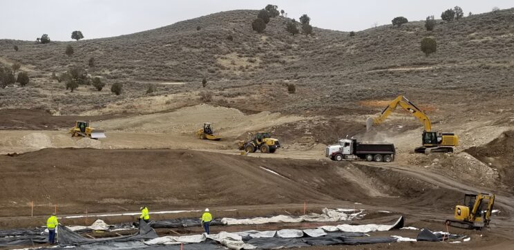 AccuRite Excavation's construction of a 300-meter shooting range at Camp Williams, showcasing their expertise in large-scale, precise outdoor facility development.